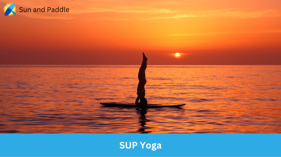 A Woman Doing Yoga on a Paddleboard While the Sun Sets
